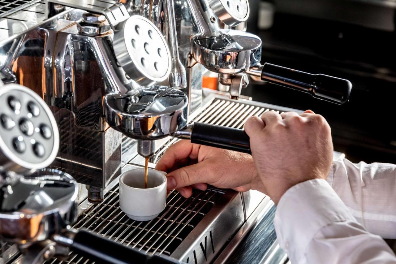 Radisson Blu Es. Hotel, Roma Exterior foto Espresso machine